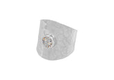 Cubic zirconia hammered cuff ring from Hill to Street over a white background